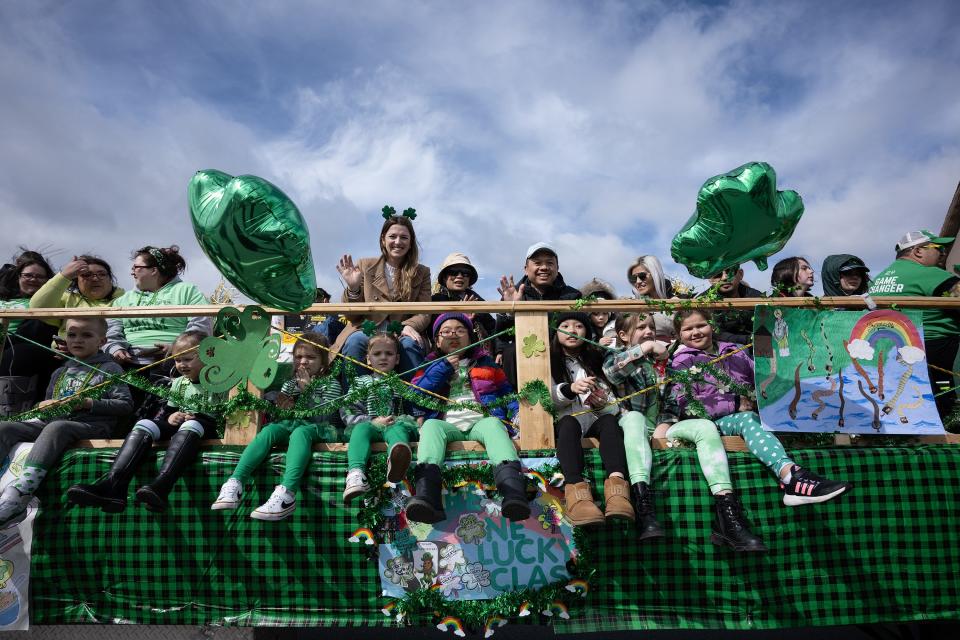 A float from Our Lady of the Angels School waves during the Worcester County St. Patrick’s Parade Sunday.