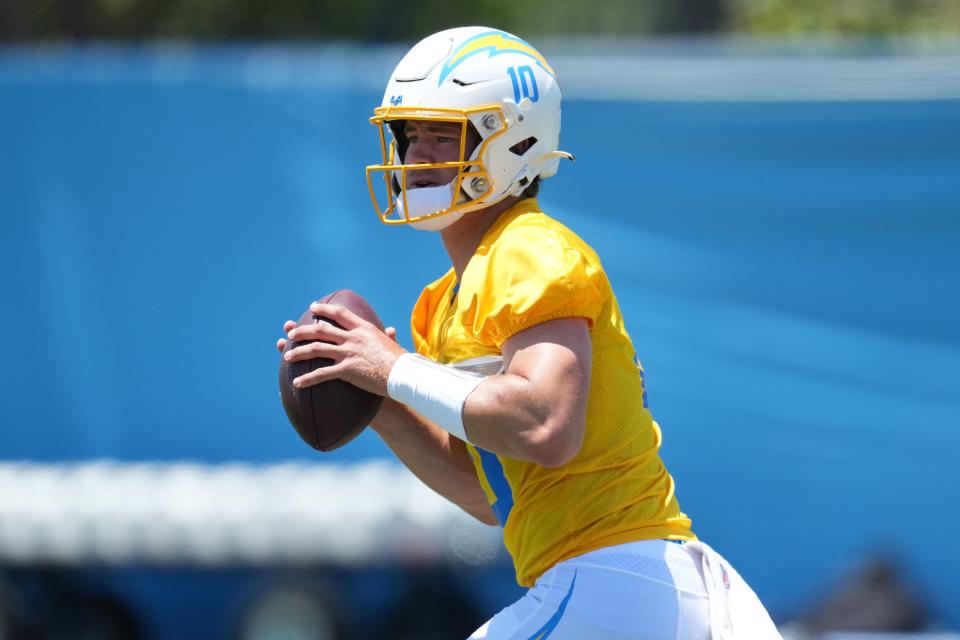 Justin Herbert works out during the Chargers' organized team activities at Hoag Performance Center.