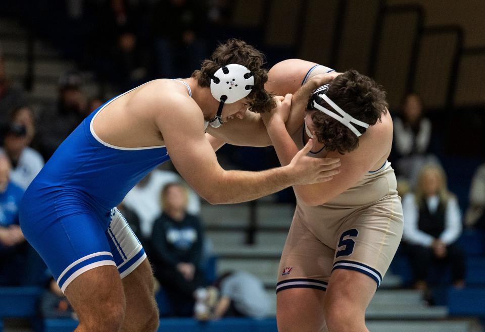 Quakertown's Calvin Lachman against Council Rock South's Jeff Gessner during their 285lbs wrestling match in Holland on Wednesday, Dec. 13, 2023.

Daniella Heminghaus | Bucks County Courier Times