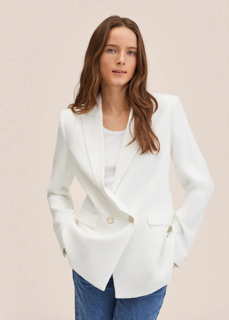 Double-breasted suit blazer. Image via Mango.