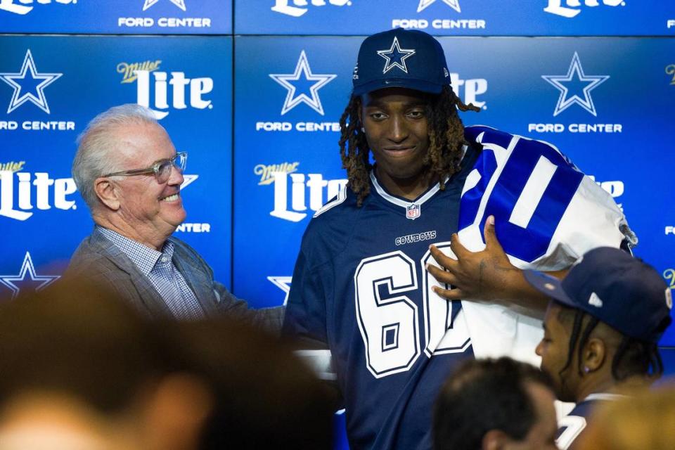 Dallas Cowboys Chief Operating Officer Stephen Jones embraces the teams first round pick Tyler Guyton following his introductory press conference at The Star in Frisco on Friday, April 26, 2024.