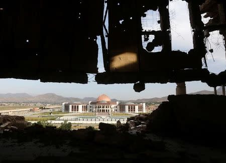 Afghanistan's new parliament building is seen from the ruins of Darul Aman palace in Kabul, Afghanistan, June 5, 2016. REUTERS/Omar Sobhani