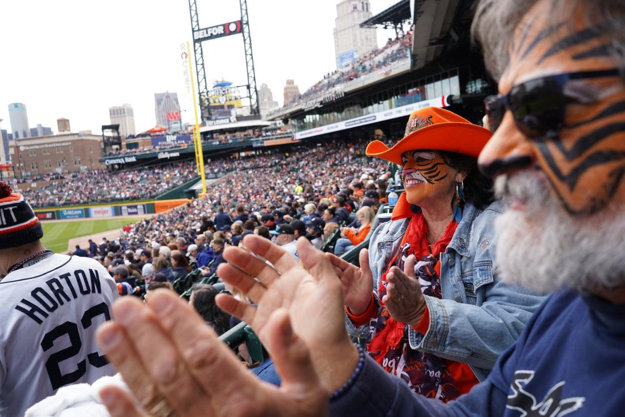 Tony Rinna of Southgate and his wife Pam Rinna of Southgate wear their tiger face paint for their 14th time during the Detroit Tigers Opening Day against the Boston Red Sox at Comerica Park in Detroit on Thursday, April 6, 2023.