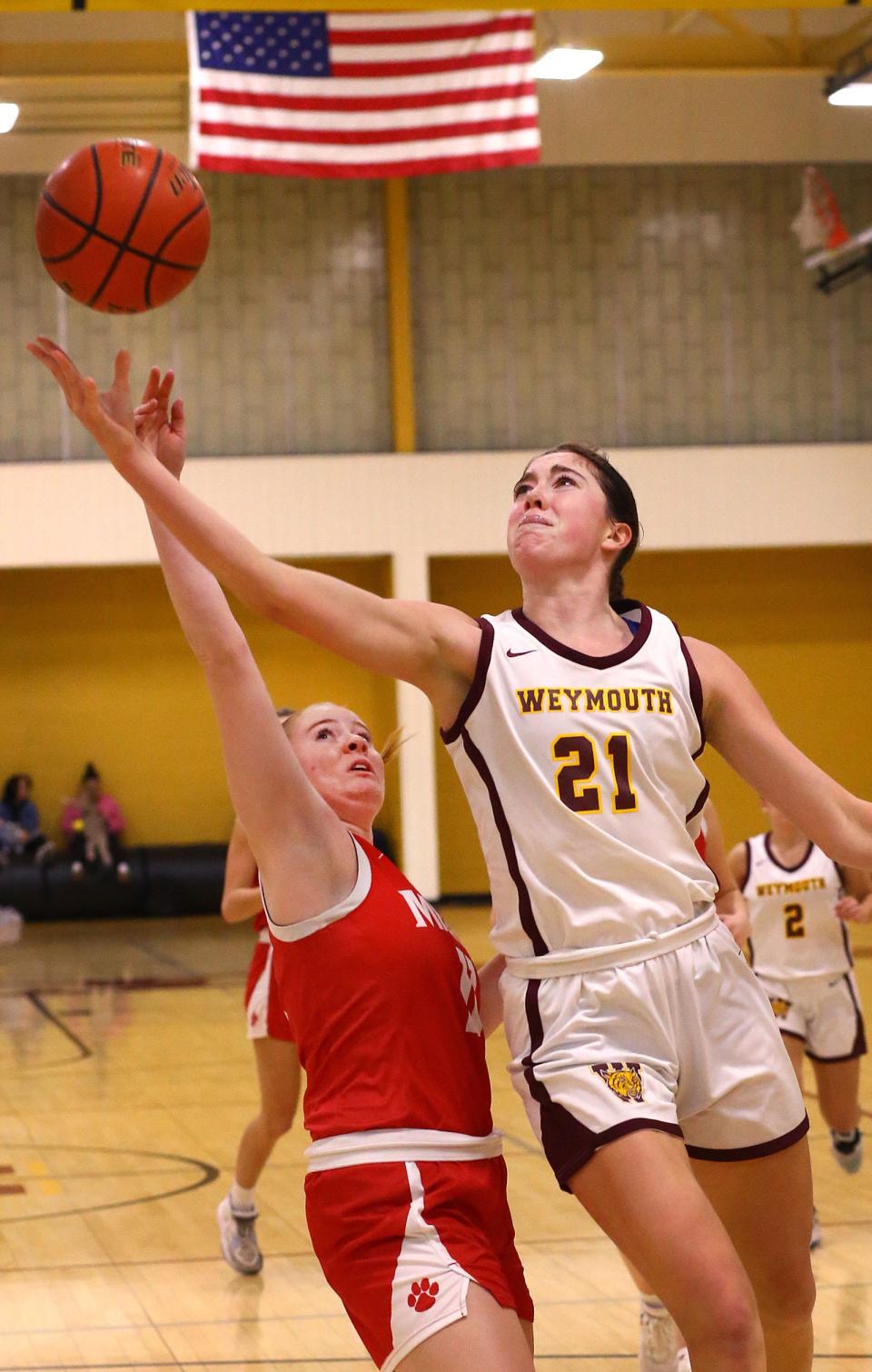 Megan Doyle of Weymouth lays a shot up and over Milton guard Christina McA'Nulty.

Battle of the Wildcat. The Weymouth Wildcats hosted the Milton Wildcats girls basketball on Friday Jan. 5, 2024