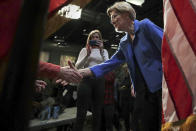 Democratic presidential candidate Sen. Elizabeth Warren, D-Mass., meets supporters after her address at the New Hampshire Institute of Politics in Manchester, N.H., Thursday, Dec. 12, 2019.(AP Photo/Charles Krupa)