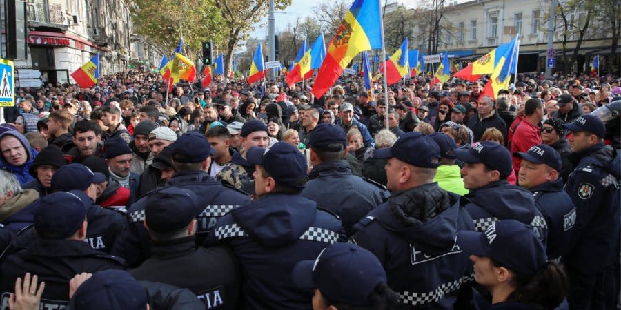Police block a street during an anti-government protest in Chisinau, Moldova. October 23, 2022