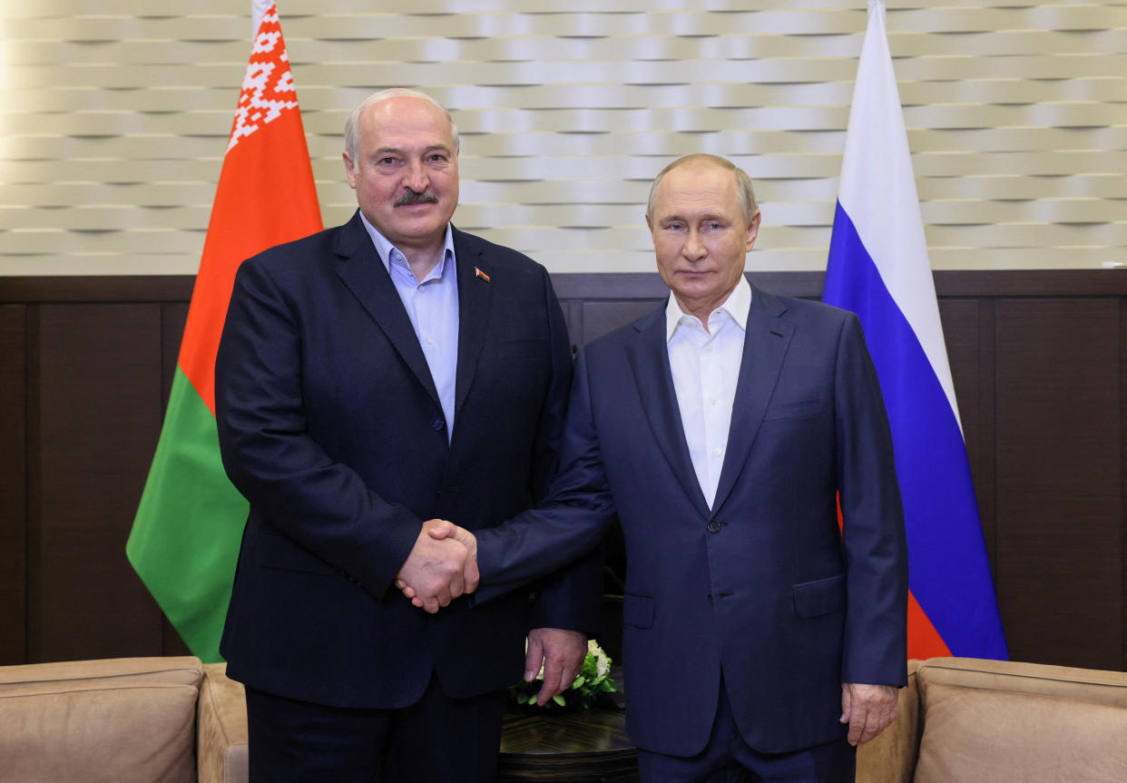 Pictured is Russian President Vladimir Putin shaking hands with his Belarusian counterpart Alexander Lukashenko 