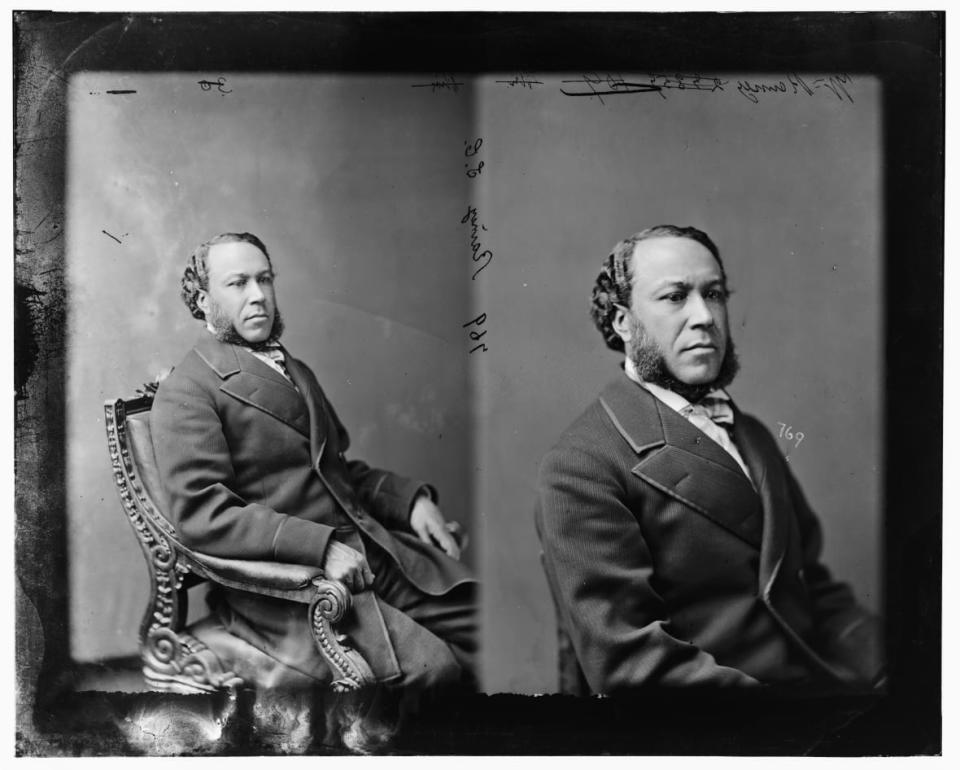 Joseph Hayne Rainey of South Carolina was the first Black person to serve in the U.S.House of Representatives and the second to serve in the U.S. Congress. During the Civil War, he was forced by the confederate army to work on fortifications in Charleston. He fled to Bermuda, where his parents were born, and returned to the United States after the war, in 1866. (Artist unknown; Photo by Heritage Art/Heritage Images via Getty Images)