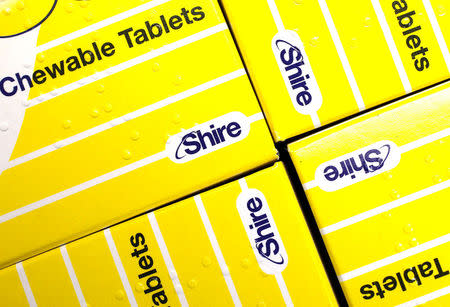 FILE PHOTO: Vitamins made by Shire are displayed at a chemist's in northwest London, Britain, July 11, 2014. REUTERS/Suzanne Plunkett/File Photo
