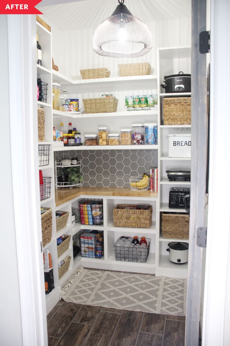 After: Pantry with wood shelving, baskets for goods, and a pendant light