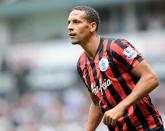 <p><b>5. Rio Ferdinand (football) £44m (£44m)</b></p> <p>Queens Park Rangers' English defender Rio Ferdinand looks on during their English Premier League football match against Tottenham Hotspur at White Hart Lane in north London on August 24, 2014</p>