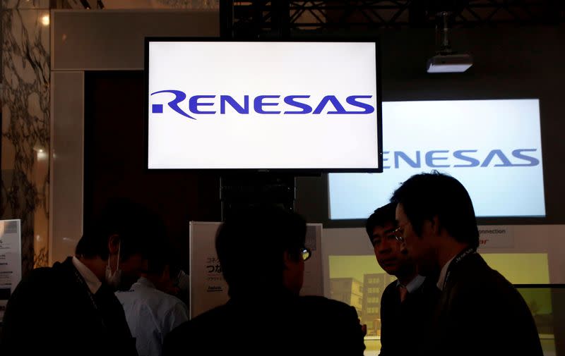 FILE PHOTO: FILE PHOTO: Renesas Electronics Corp's logos are pictured at the company's conference in Tokyo