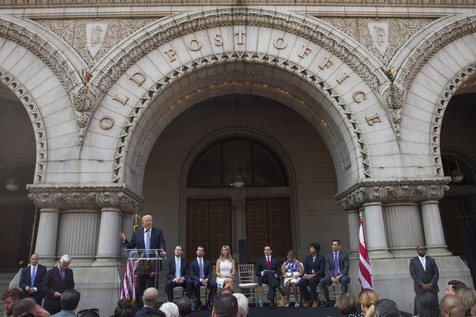 FILE - In this July 23, 2014 file photo, Donald Trump speaks during a ground breaking ceremony for the Trump International Hotel on the site of the Old Post Office, in Washington. Former New York Yankees slugger Alex Rodriguez, once vilified by Trump as a “druggie” and “joke” unworthy of wearing the pinstripes, is now a key part of an investment group seeking to buy the rights to the ex-president’s marquee Washington, D.C., hotel, people familiar with the deal told The Associated Press. (AP Photo/Evan Vucci, file)