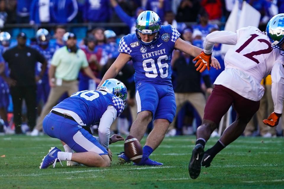 Dec 31, 2019; Charlotte, North Carolina, USA;  Kentucky Wildcats place kicker Matt Ruffolo (96) adds the extra point against the Virginia Tech Hokies during the second half of the Belk Bowl at Bank of America Stadium.