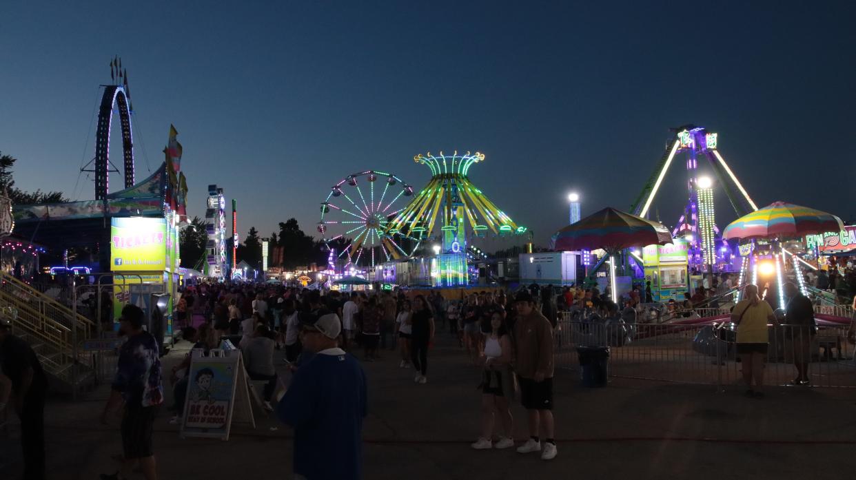 The Lenawee County Fair midway was busy Friday evening.