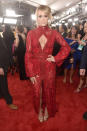 <p>The country queen looked red hot on the red carpet in a glittering high-collared gown by Elie Madi. </p>