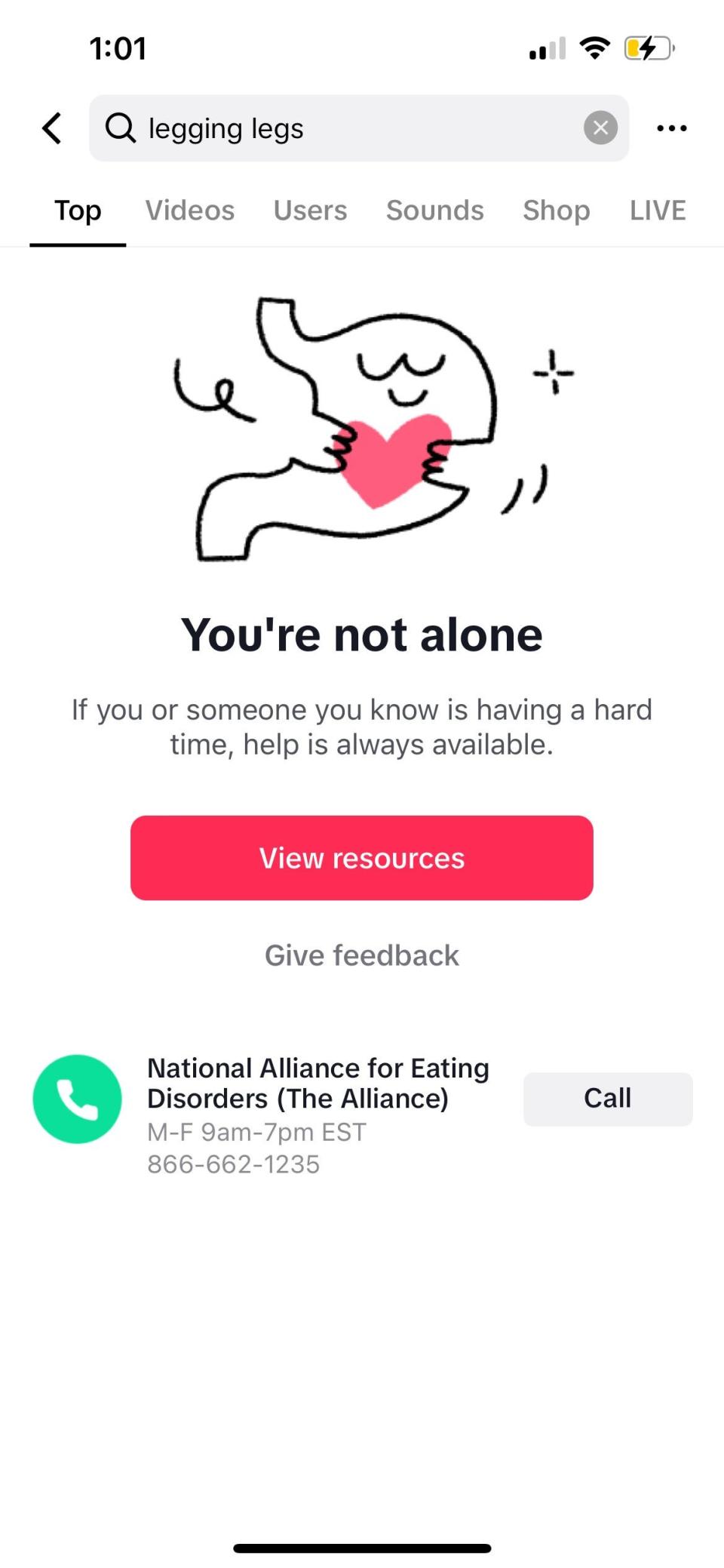 A search for "legging legs" on TikTok provides users with resources for eating disorders. Users are provided with an explanation of what eating disorders are and tips on how to approach body image and concerns.