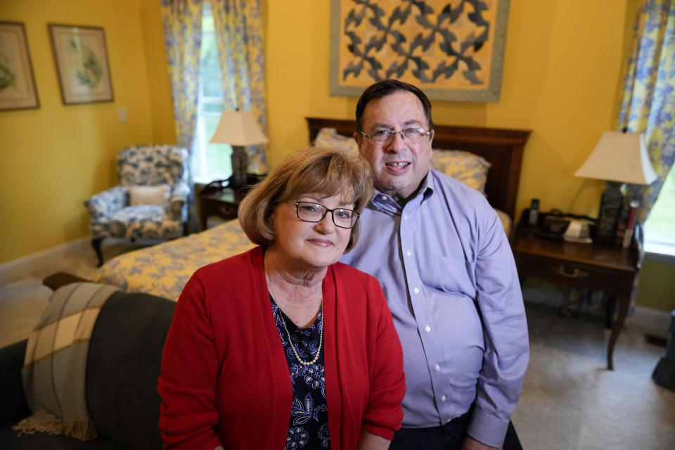 Gene and Sallie Carr pose for a picture in their recently remodeled home on Tuesday, May 7, 2024, in Hendersonville, N.C. An increasing number of Americans in their late 50s and older are staying in their houses, some by choice, others because they're locked into low mortgage rates that are too low to give up. (AP Photo/Chris Carlson)