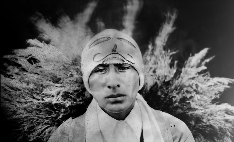 <p>Aldair Monchea, 15, poses for a portrait in the Sinakara Valley, in Peru’s Cuzco region, during the Qoyllur Rit’i festival, translated from the Quechua language as Snow Star. Aldair, who represents the Tahuantinsuyo nation, performs in a colonial war dance known as Sarge Pusay, which plays out an acrimonious battle over land boundaries. (Photo: Rodrigo Abd/AP) </p>