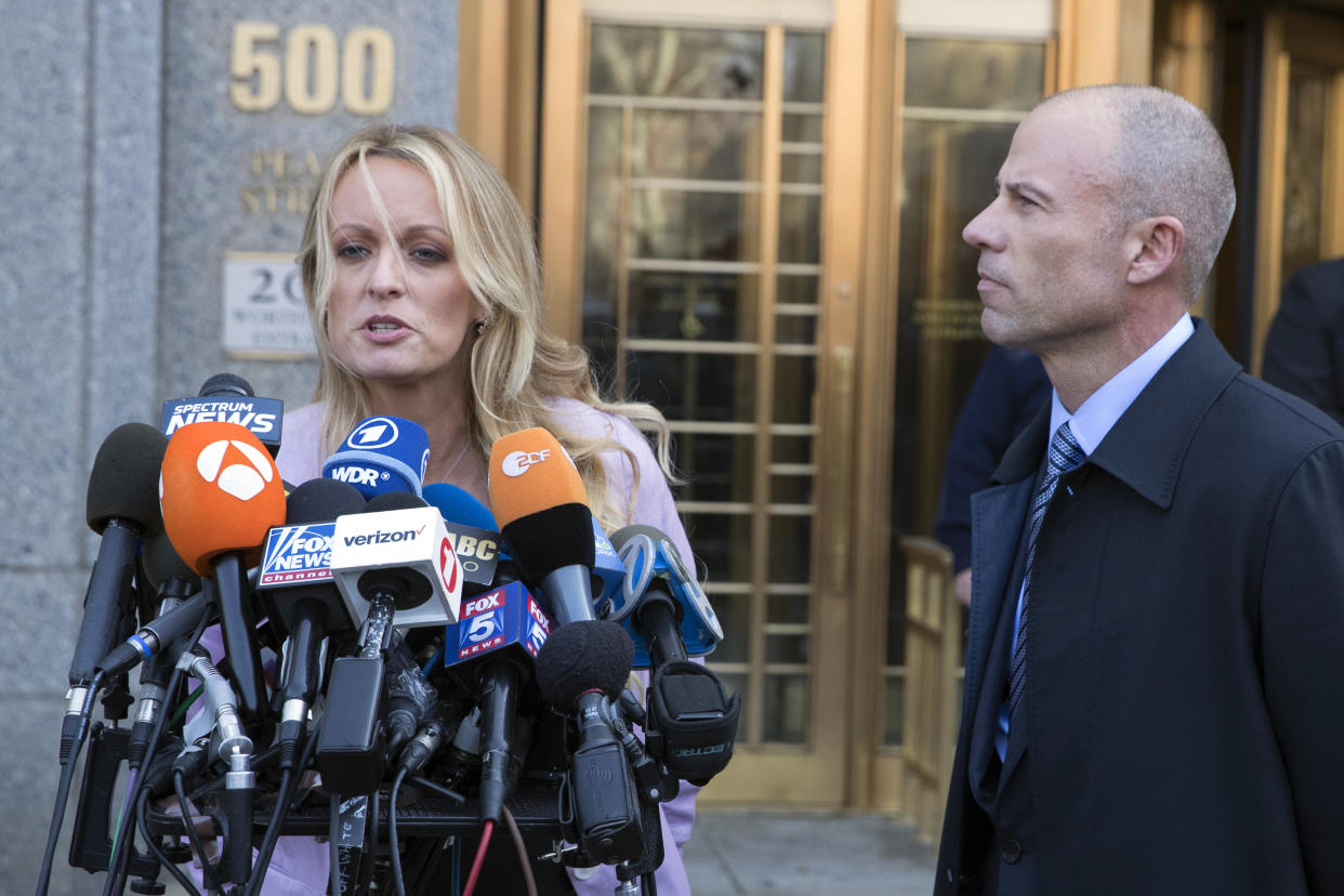 Adult film actress Stormy Daniels, left, speaks as Avenatti listens outside federal court on April 16, 2018, in New York. (Photo: Mary Altaffer/AP)