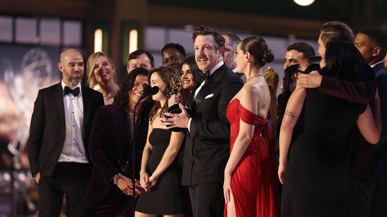  Jason Sudeikis and cast and crew accept the Outstanding Comedy Series award for "Ted Lasso" on stage during the 74th Annual Primetime Emmy Awards. 