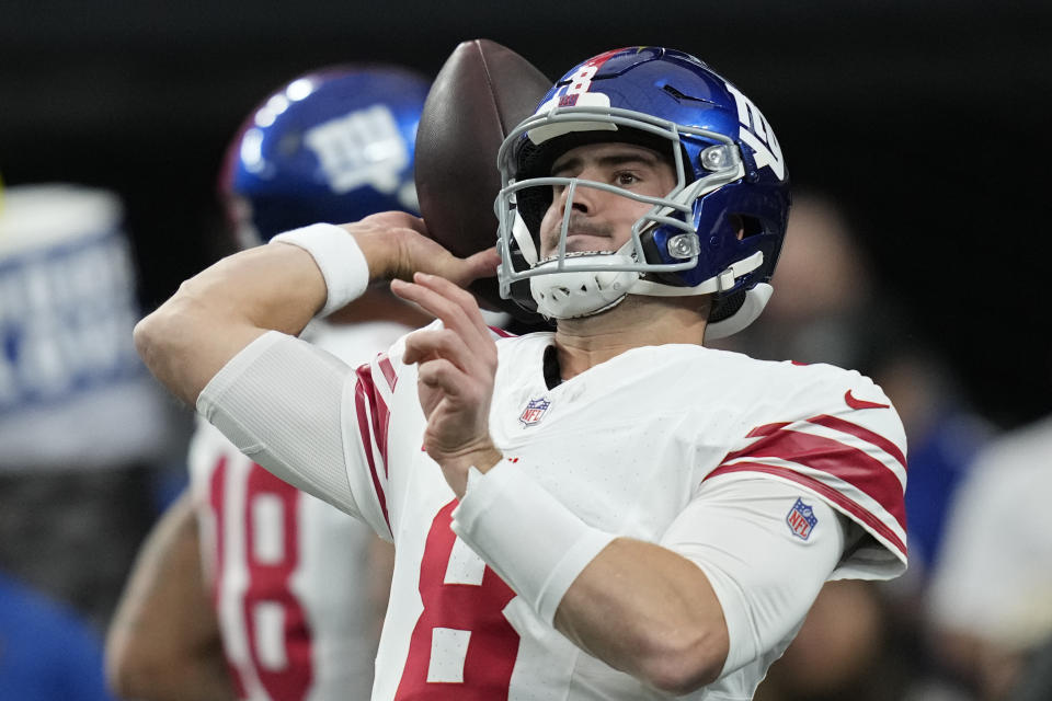 New York Giants quarterback Daniel Jones (8) warms up before an NFL football game against the Las Vegas Raiders, Sunday, Nov. 5, 2023, in Las Vegas. (AP Photo/John Locher)