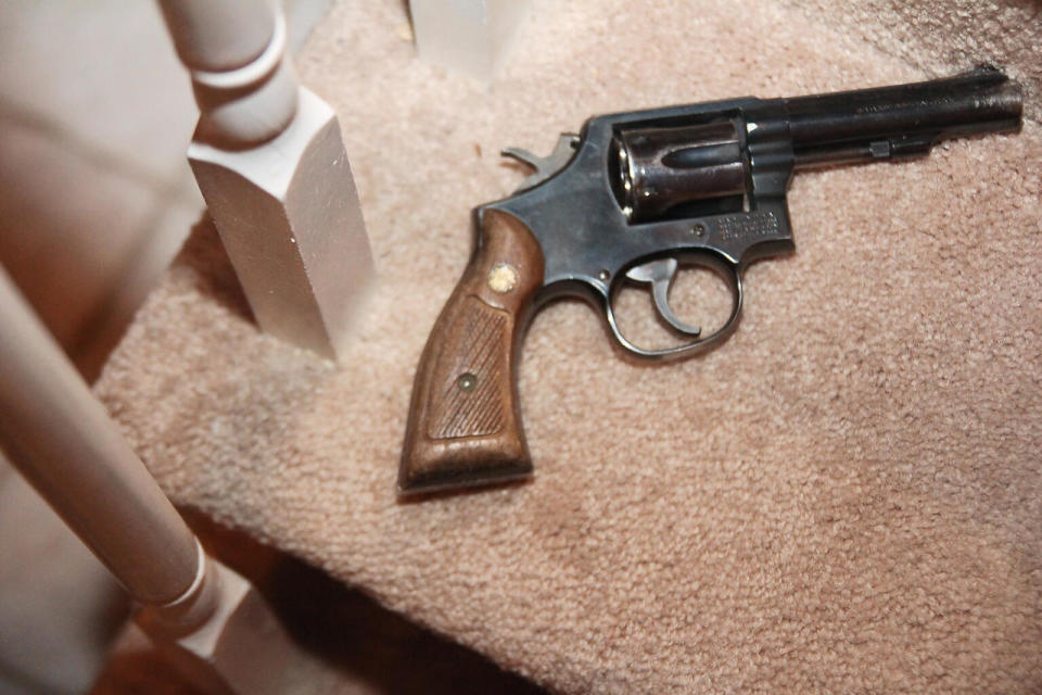 Evidence photo: The gun as seen on the staircase of Virginia Vertetis' home  / Credit: Morris County Prosecutor's Office