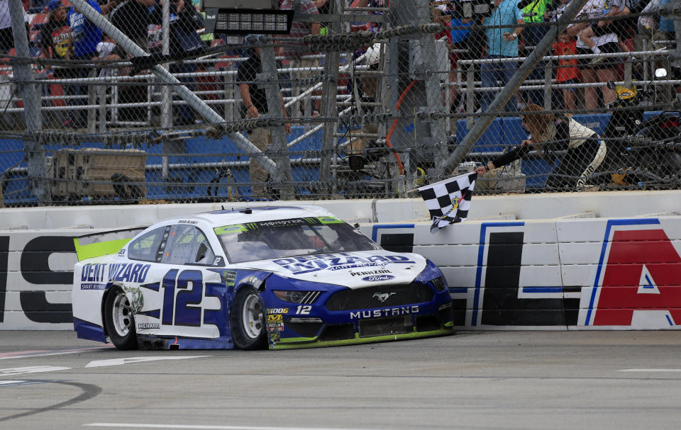 Ryan Blaney gets the checkered flag after winning at Talladega. (Photo by Jeff Robinson/Icon Sportswire via Getty Images)