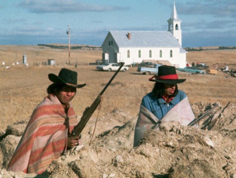 <span class="caption">Wounded Knee protest in 1973.</span> <span class="attribution"><span class="source">Still from PBS documentary.</span></span>