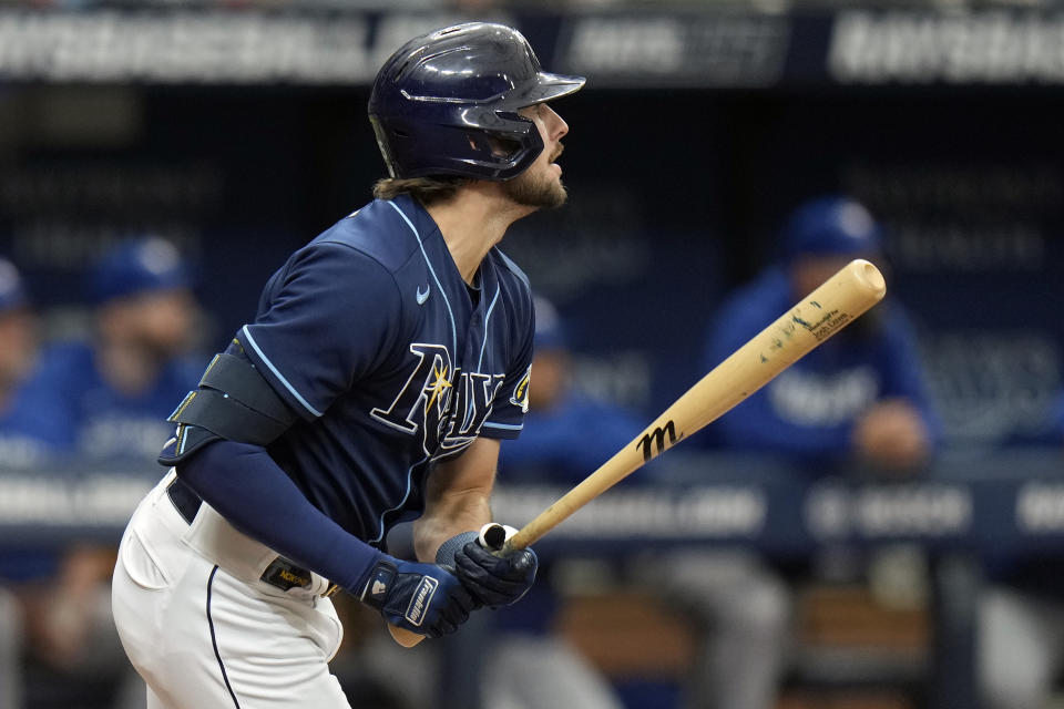 Tampa Bay Rays' Josh Lowe watches his RBI double off Toronto Blue Jays starting pitcher Alek Manoah during the second inning of a baseball game Thursday, May 25, 2023, in St. Petersburg, Fla. (AP Photo/Chris O'Meara)