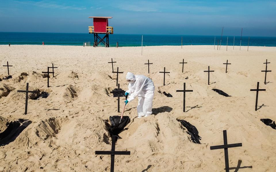 An aerial perspective of the graves dug by the NGO 'Rio De Paz' as part of their protest against President Jair Bolsonaro - Buda Mendes/Getty Images South America