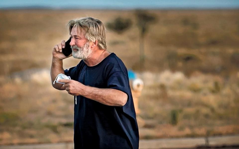 Alec Baldwin on the phone following questioning over the accidental shooting of Halyna Hutchins on the film Rust