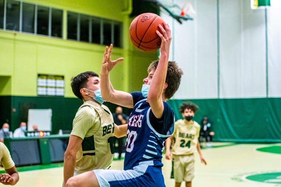 Apponequet's Joshua Keller attacks the basket.