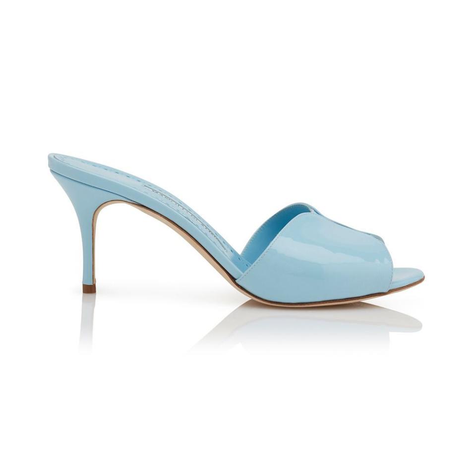 <p><a href="https://sale.manoloblahnik.com/us/houramu-55554.html?ff=3&fp=55554&gclid=CjwKCAjwv8qkBhAnEiwAkY-ahnwnK5y4Ute65x6howbCpPm3wik6ZLo1paSg_-kqW1QJE-8S6in3oxoCP3gQAvD_BwE" rel="nofollow noopener" target="_blank" data-ylk="slk:Shop Now;elm:context_link;itc:0;sec:content-canvas" class="link ">Shop Now</a></p><p>Houramu Light Blue Patent Leather Mules</p><p>manoloblahnik.com</p><p>$477.00</p>