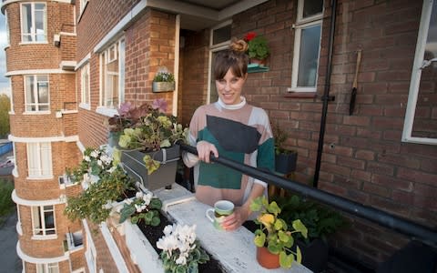 Alice Vincent in her balcony garden - Credit: David Rose