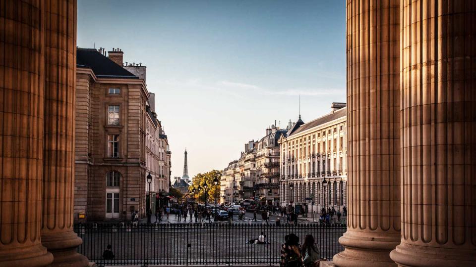 A view of a Paris street with the Eiffel Tower in view