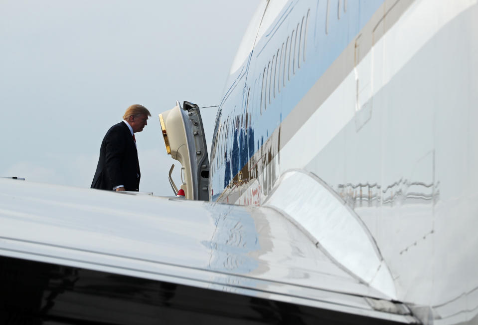 President Trump boards Air Force One after his summit with North Korean leader Kim Jong Un in Singapore on June 12, 2018. (Photo: Jonathan Ernst/Reuters)