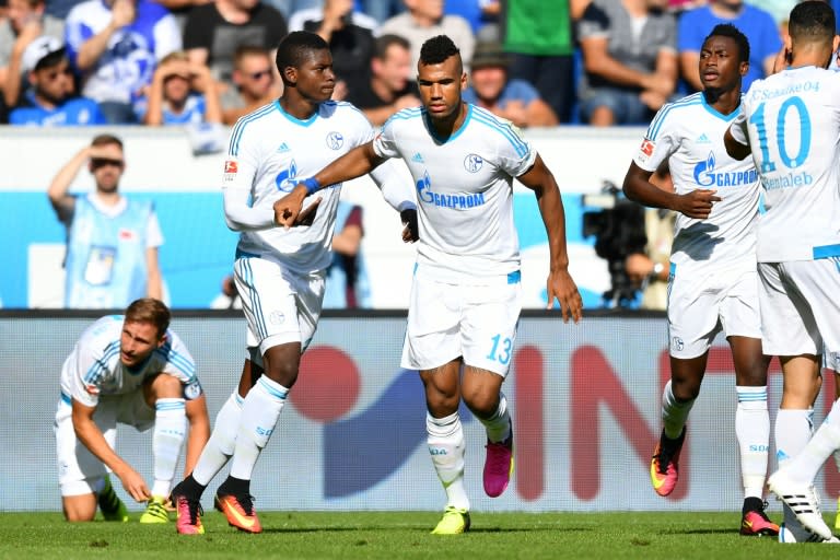 Schalke's striker Eric Maxim Choupo-Moting (C) celebrates scoring against Hoffenheim on September 25, 2016