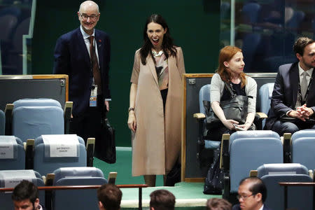 New Zealand Prime Minister Jacinda Ardern reacts as she sees her baby Neve at the Nelson Mandela Peace Summit during the 73rd United Nations General Assembly in New York, U.S., September 24, 2018. REUTERS/Carlo Allegri