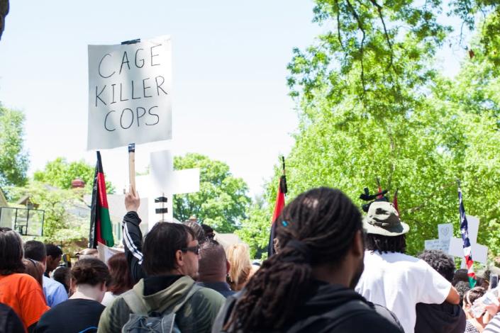 People protest outside the house of Prosecutor Timothy McGinty in reaction to Cleveland police officer Michael Brelo being acquitted of manslaughter charges, on May 23, 2015 in Cleveland, Ohio (AFP Photo/Ricky Rhodes)