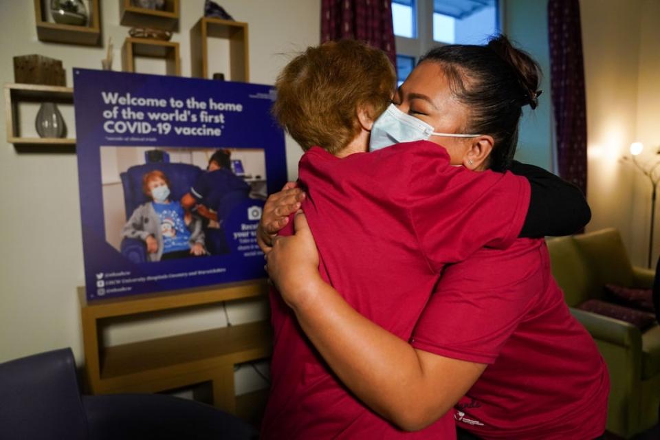 Margaret Keenan embraces Nurse May Parsons (PA)