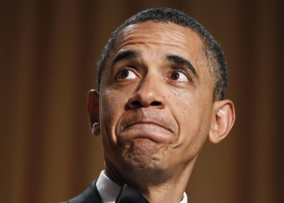 President Barack Obama makes a face as they show his video during his speech at the White House Correspondents’ Association dinner in Washington, Saturday, April 30, 2011. (Photo: Manuel Balce Ceneta/AP)