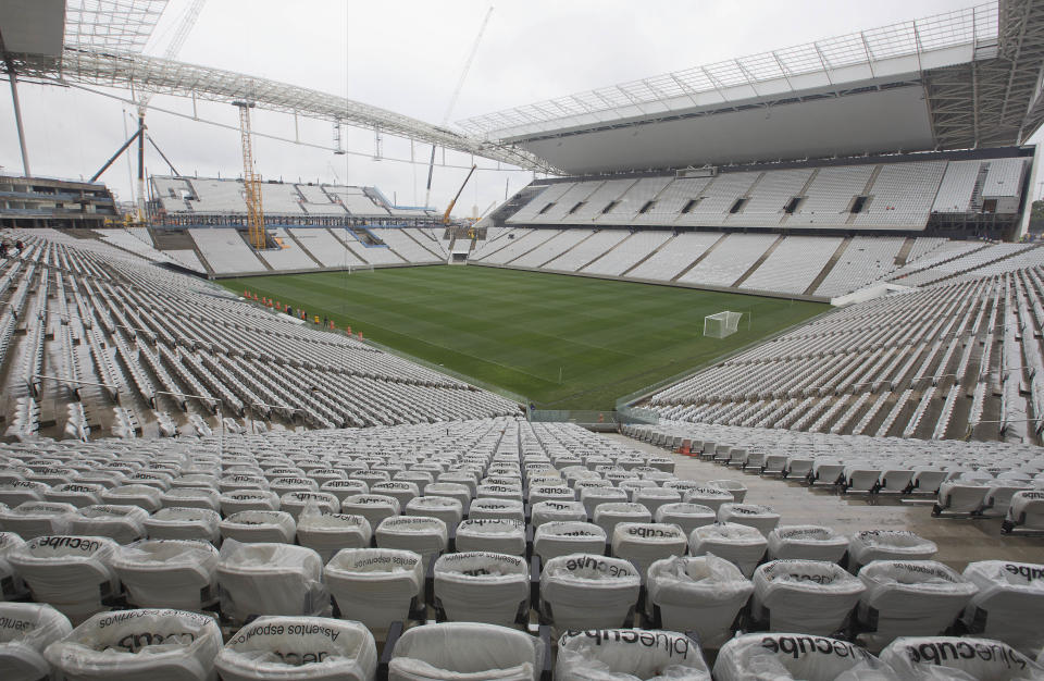 A general view of the still unfinished Itaquerao stadium in Sao Paulo, Brazil, Tuesday, April 15, 2014. The stadium that will host the World Cup opener match between Brazil and Croatia on June 12, will hold nearly 70,000 people in the opener, but after the World Cup its capacity will be reduced to about 45,000. (AP Photo/Andre Penner)