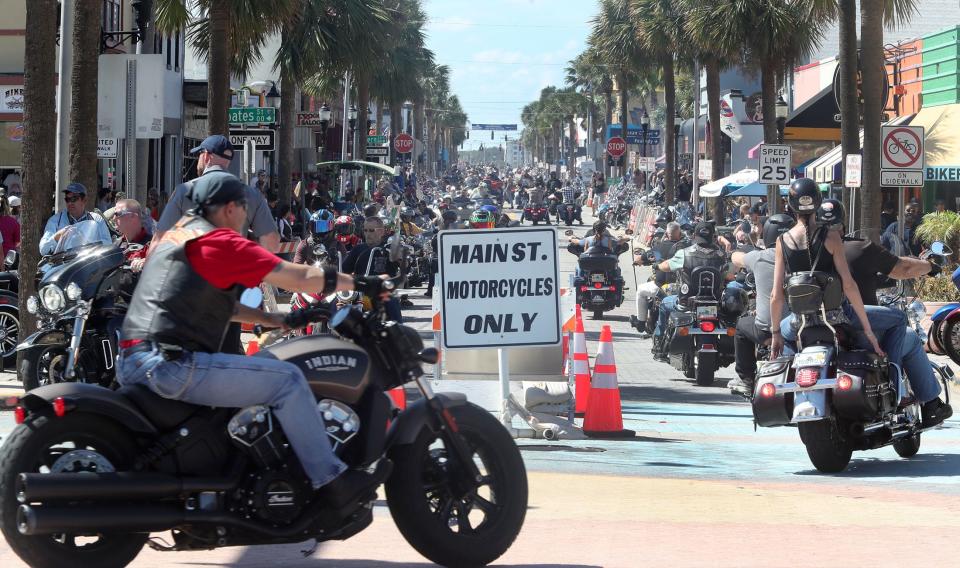 Motorcycles roll along Main Street on Saturday as Biketoberfest shifts into high gear in Daytona Beach. This year's 30th anniversary edition of the four-day event offered a welcome boost to area businesses in the wake of damages and disruptions from Tropical Storm Ian.