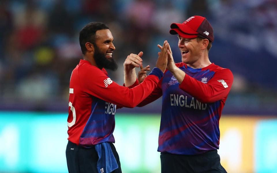 Adil Rashid and Eoin Morgan celebrate during England thrashing of West Indies last October - GETTY IMAGES
