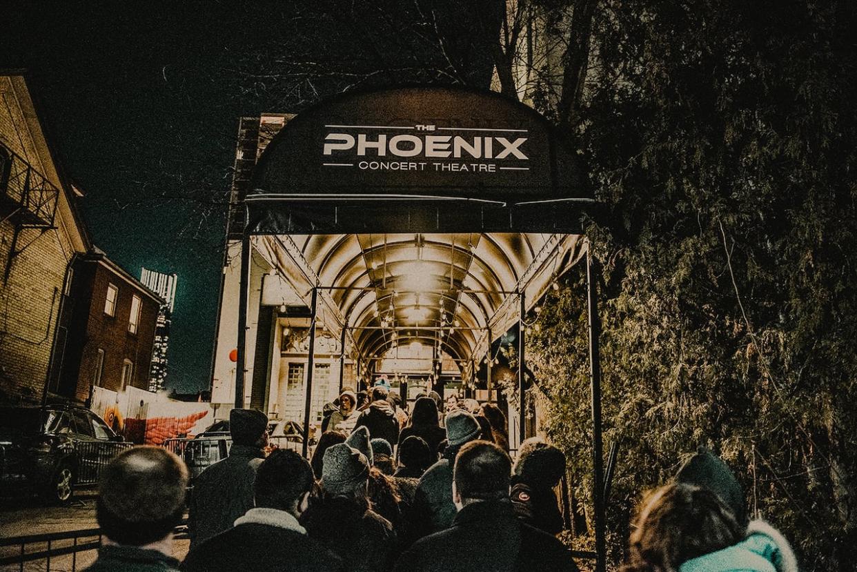 Fans line up for a live show at The Phoenix Concert Theatre, pre-COVID. The theatre's current location on Sherbourne Street will host its last show in January. (Submitted by The Phoenix Concert Theatre - image credit)
