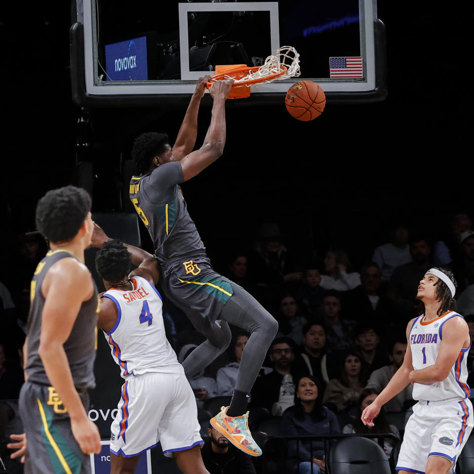 Baylor forward Josh Ojianwuna (15) dunks against the Florida during the first half of an NCAA college basketball game in the NIT Season Tip-Off, Friday, Nov. 24, 2023, in New York. (AP Photo/Eduardo Munoz Alvarez)