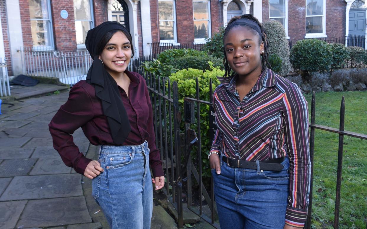 Volunteers: Bristol University students Nelima Hossain (left) and Chelsea Henshaw (right) - Jay Williams