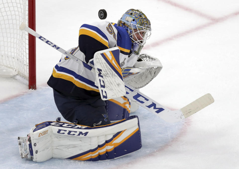 St. Louis Blues goaltender Jordan Binnington turns a shot away during the second period in Game 7 of the NHL hockey Stanley Cup Final against the Boston Bruins, Wednesday, June 12, 2019, in Boston. (AP Photo/Charles Krupa)