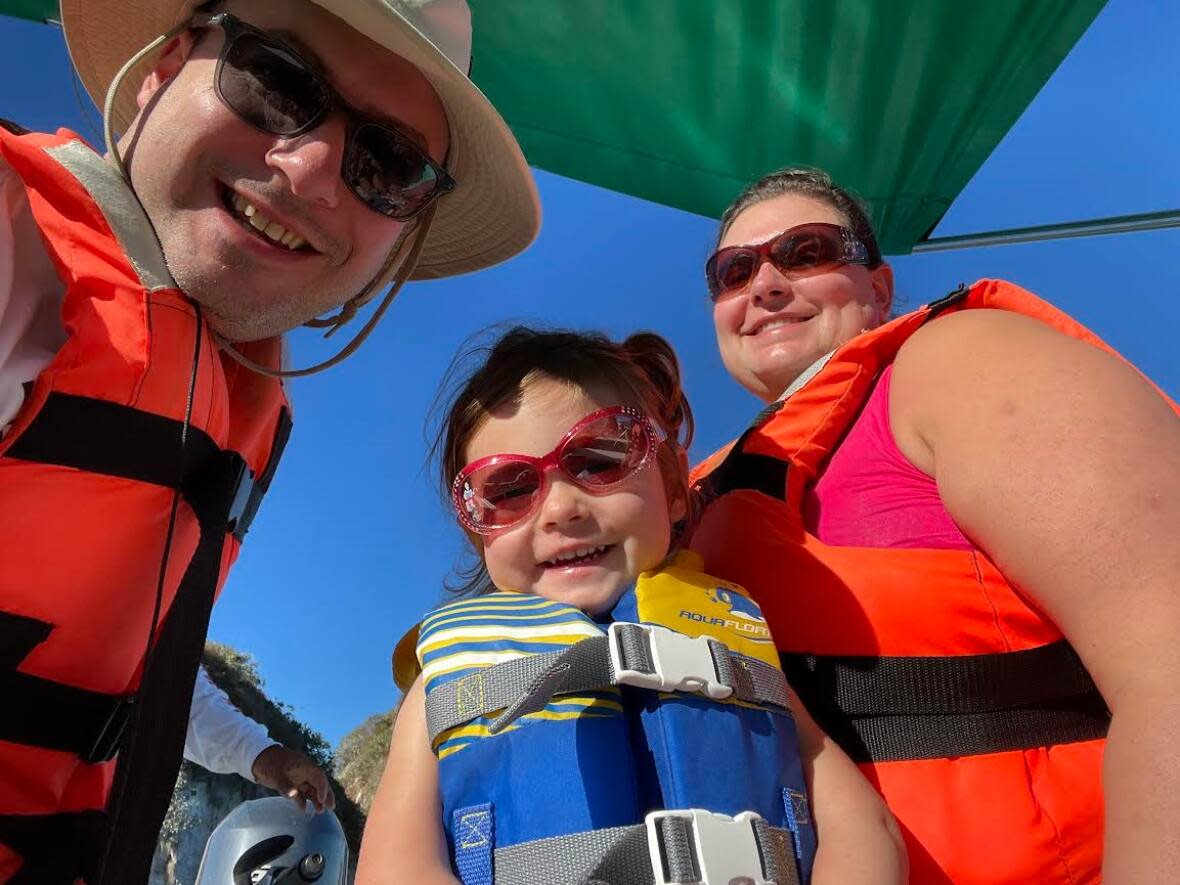 Mycroft Schwartz, Irina Schwartz and their daughter Sarah, 2, went to Puerto Vallarta at the end of December.  (Submitted by Mycroft Schwartz  - image credit)